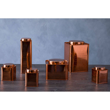 Set of seven chai square copper metal tea canisters with reflective square copper finish and matching lids