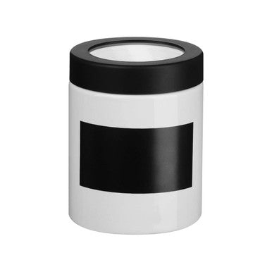White cylindrical chalk board small canister with a black lid and a black rectangular label on its side