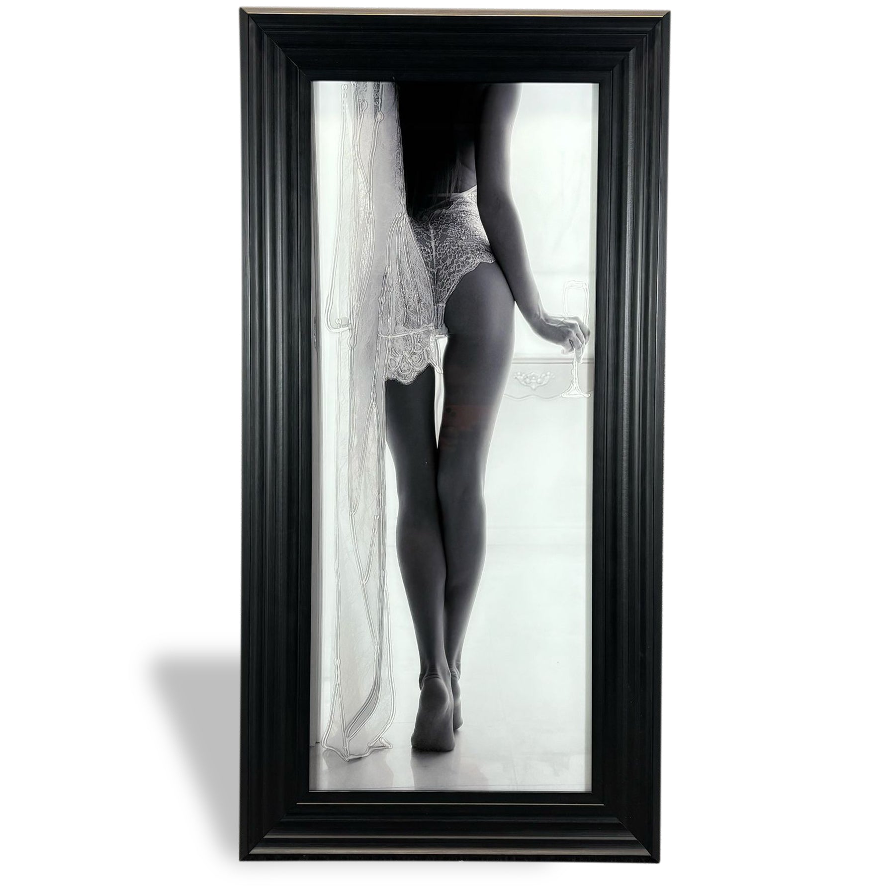 Black-framed vertical art print featuring a monochrome image of a woman in lace lingerie and veil titled champagne and lace