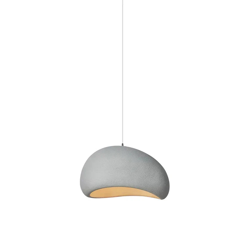 Gray concrete pendant light chandan light with warm-toned interior perfect for cozy ambient lighting
