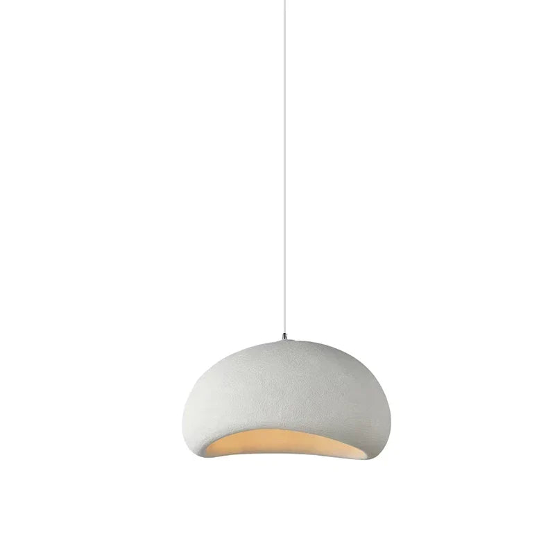 Chandan Light minimalist white pendant light with textured dome shade and warm-toned interior for cozy lighting
