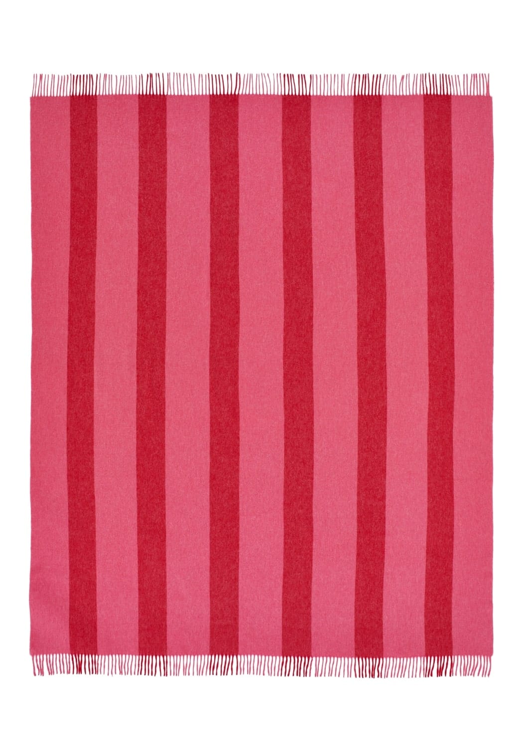 A rectangular cotton throw with vertical stripes in pink and red shades and fringed edges called Charlottes candy stripe throw