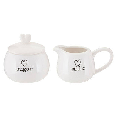 White ceramic milk and sugar set with heart shaped handles in charming all white ceramic design