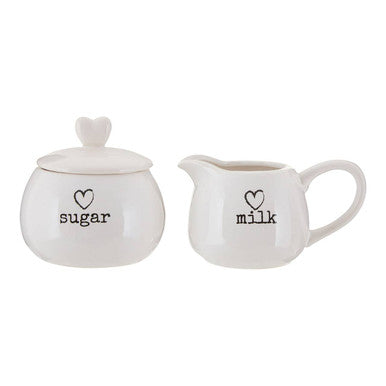 White ceramic milk and sugar set with heart-shaped decals perfect for charming ceramic milk service
