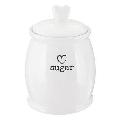 White dolomite sugar canister with heart shaped lid and black sugar text perfect for kitchen storage