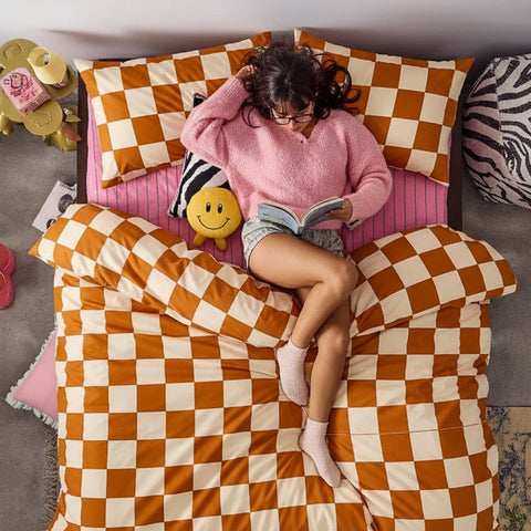 Orange and cream checkered bedding set includes duvet cover with soft cotton material in two stylish designs