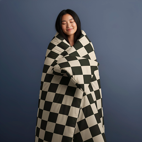 A plush oversized checkerboard bedding set includes duvet cover in bold black and cream for cozy bedroom style