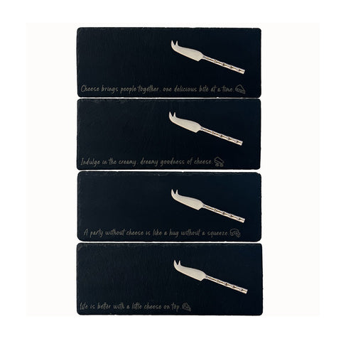 Set of four silver cheese knives with engraved handles on a dark mini slate cheese board for stylish serving