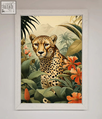 A framed wall art of a cheetah with black spots on tan fur surrounded by lush green foliage and vibrant flowers framed wall