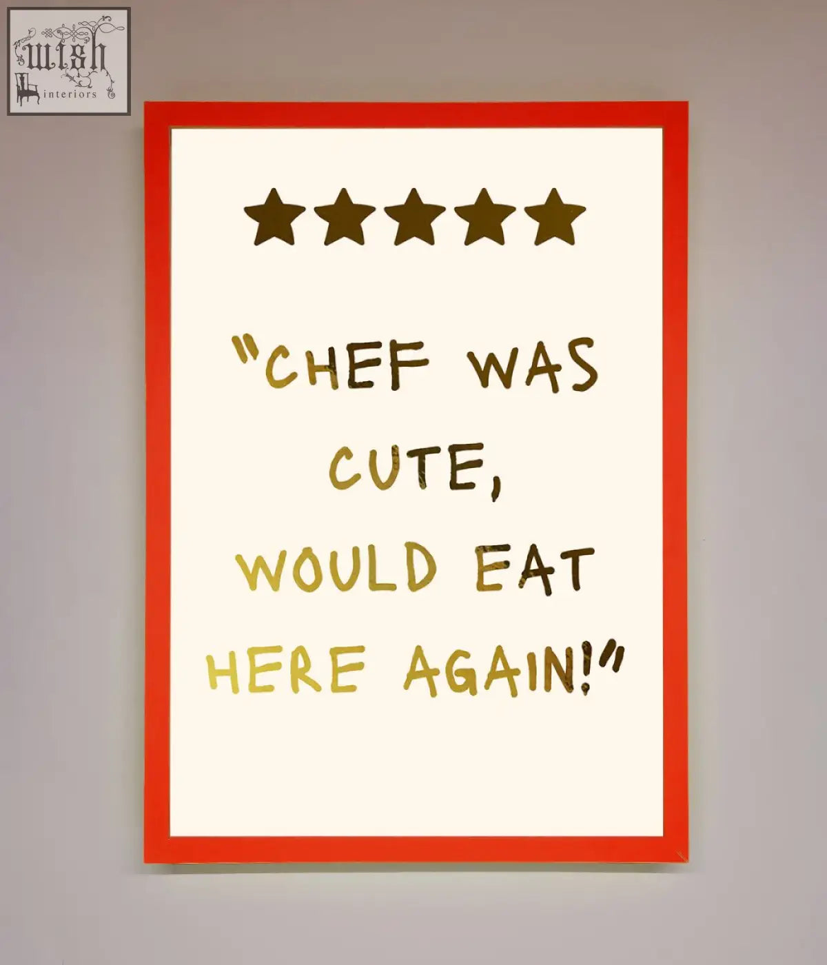 Framed chef was cute foil print with bold red border gold stars and handwritten gold text on off white background