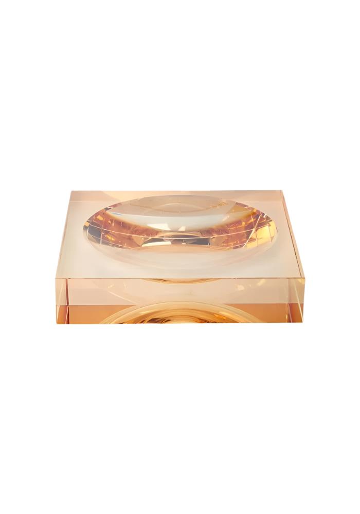 Chelsea amber glass trinket tray with a translucent amber glass ashtray featuring a smooth oval bowl on a square base