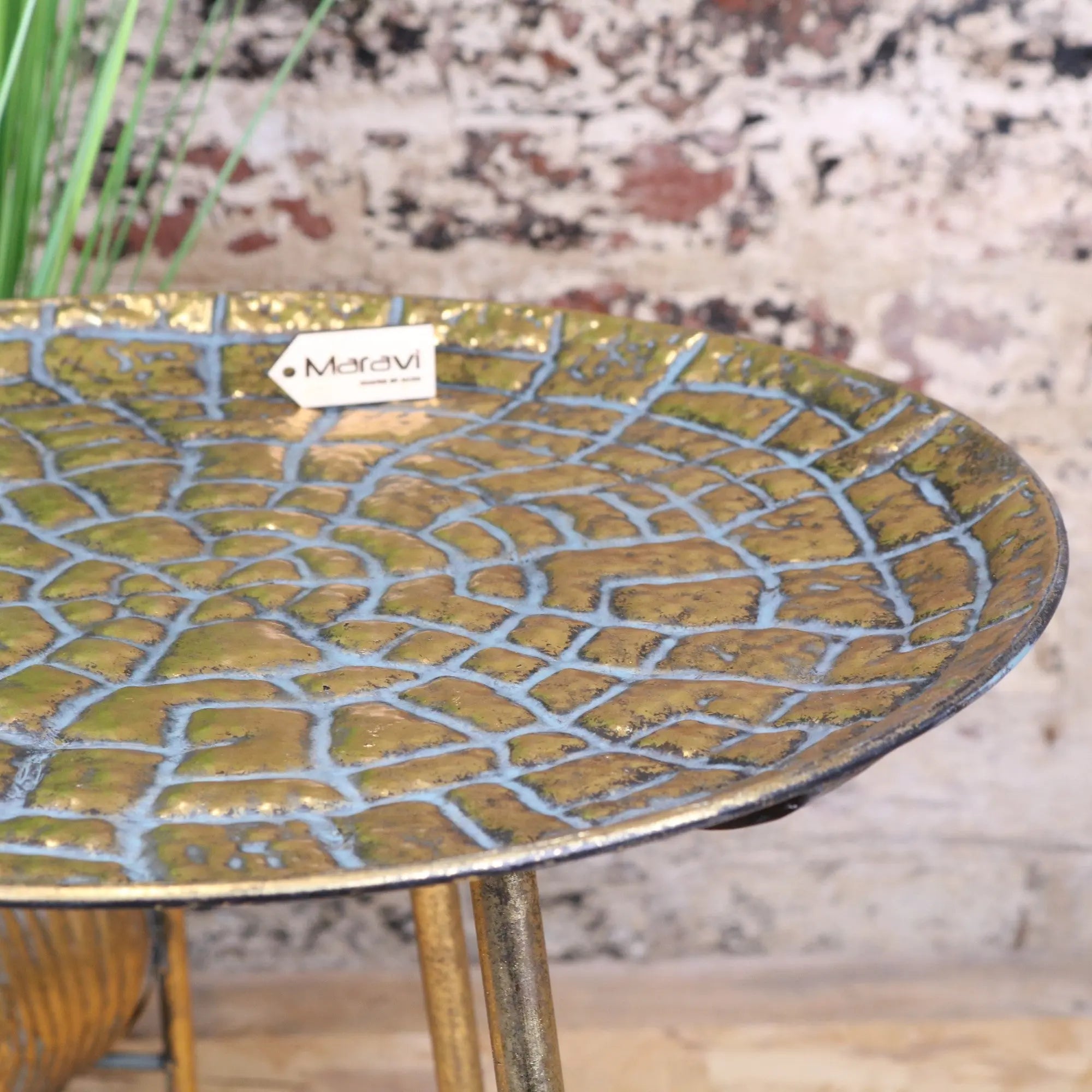 Golden mosaic-patterned ceramic bird bath with distressed metallic gold finish on slender round gold chena antiqued metal legs