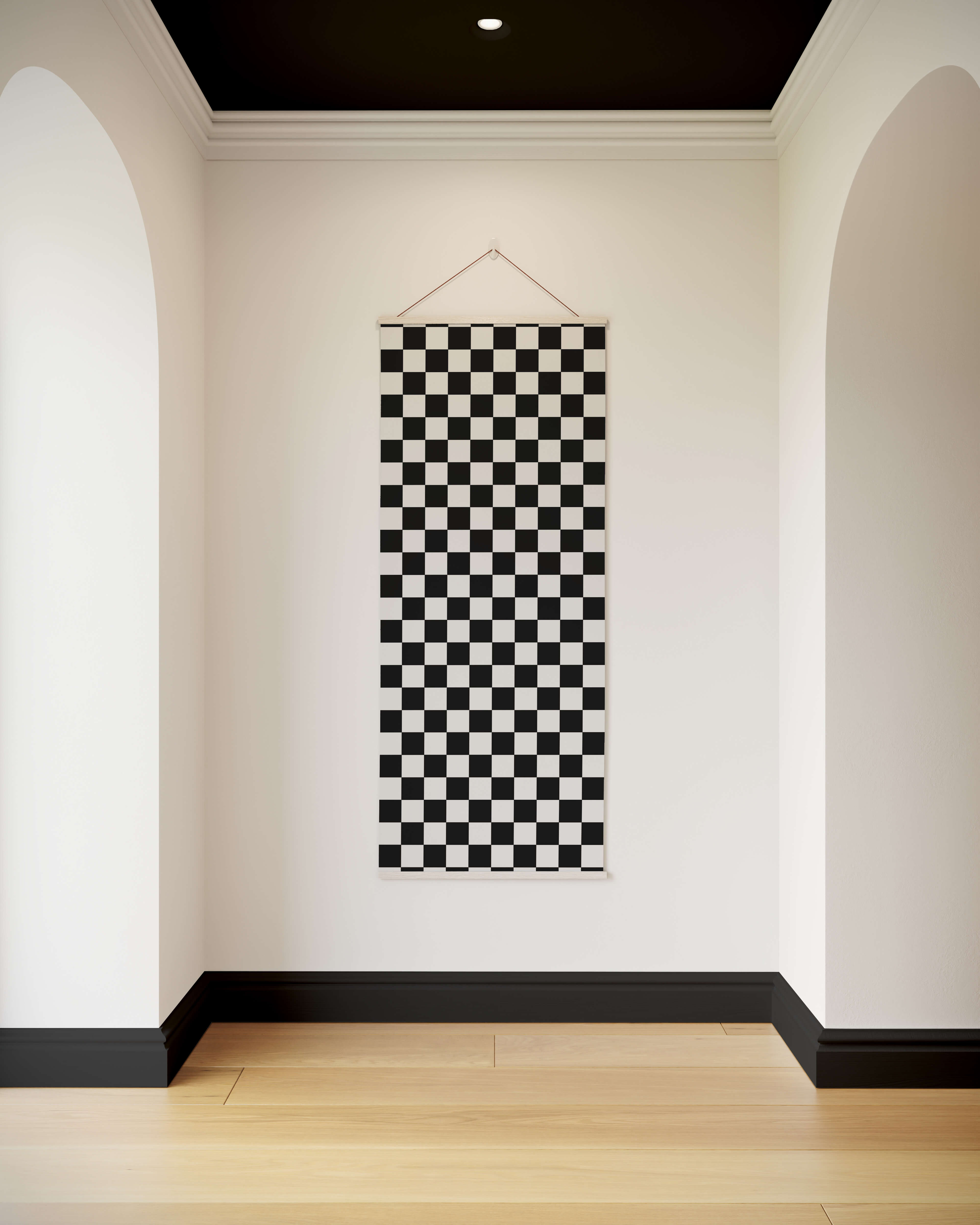 Black and white chequerboard wall tapestry with a simple triangular hanger for easy display and style