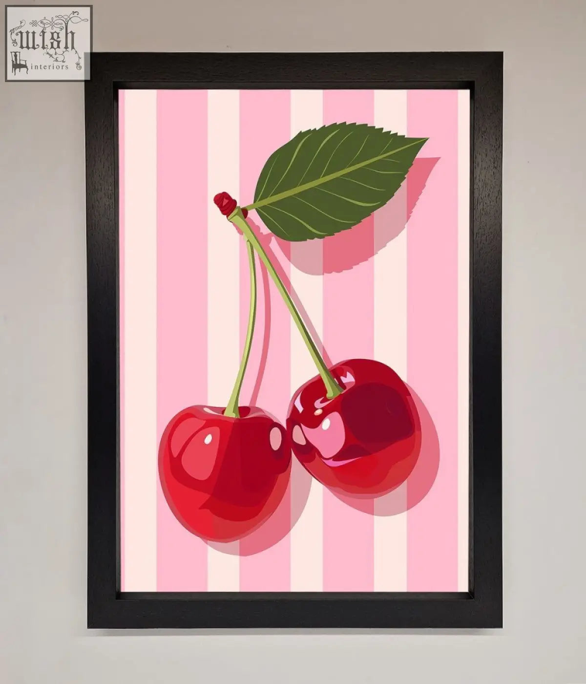 A cherries on stripes framed print featuring glossy red cherries with green stems on a pink and white stripes framed background