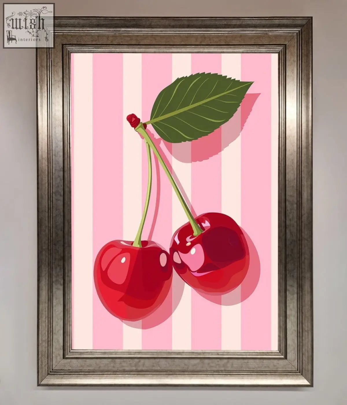 A vibrant red cherry with green stem on pink stripes in an ornate silver stripes framed print