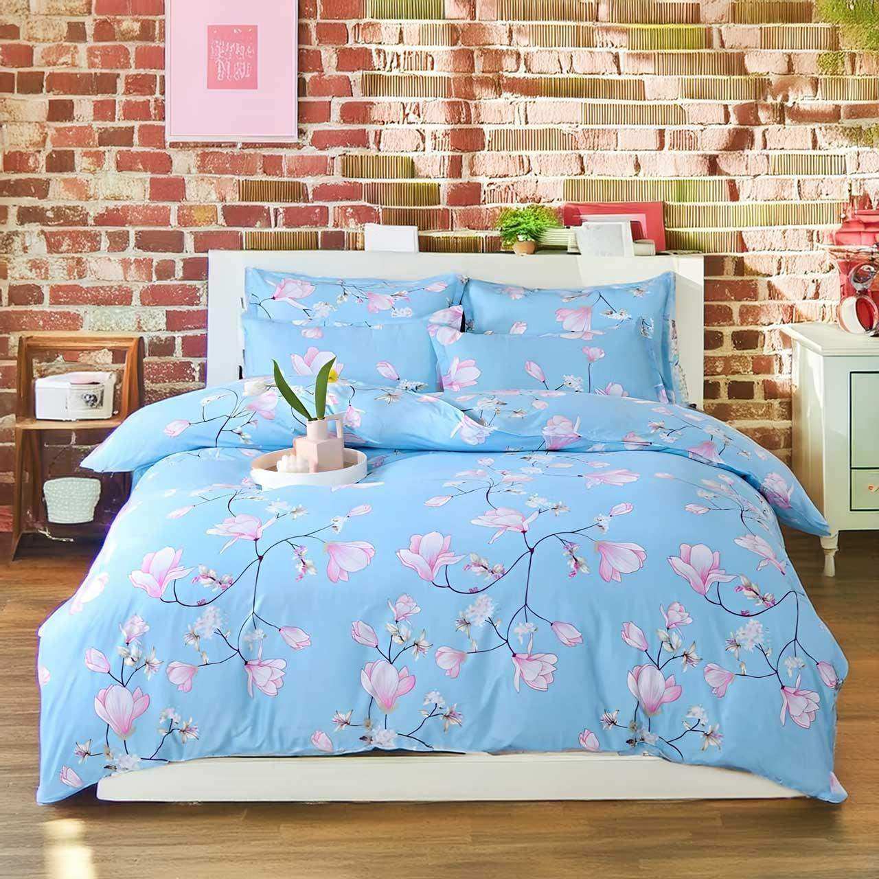Light blue cherry blossom bedding set with pink magnolia pattern includes duvet cover and flat bed sheet