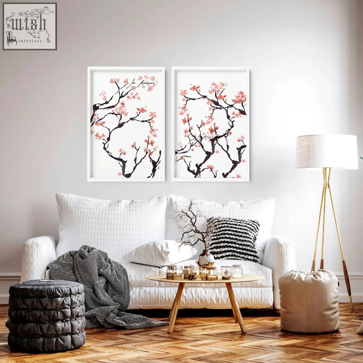 Two framed cherry blossom wall art prints with delicate pink blossoms and black branches on white background