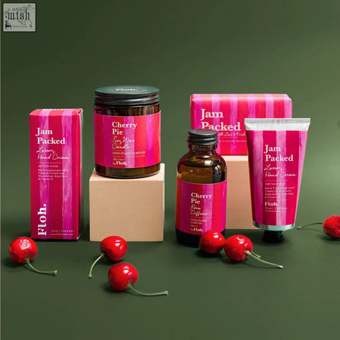 Vibrant pink jam packed hand cream tube with silver cap and black base for cherry pie apothecary pie apothecary candle
