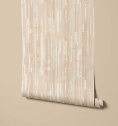 A roll of chester beige wallpaper with a modern abstract pattern of vertical stripes in cream and pale mint tones