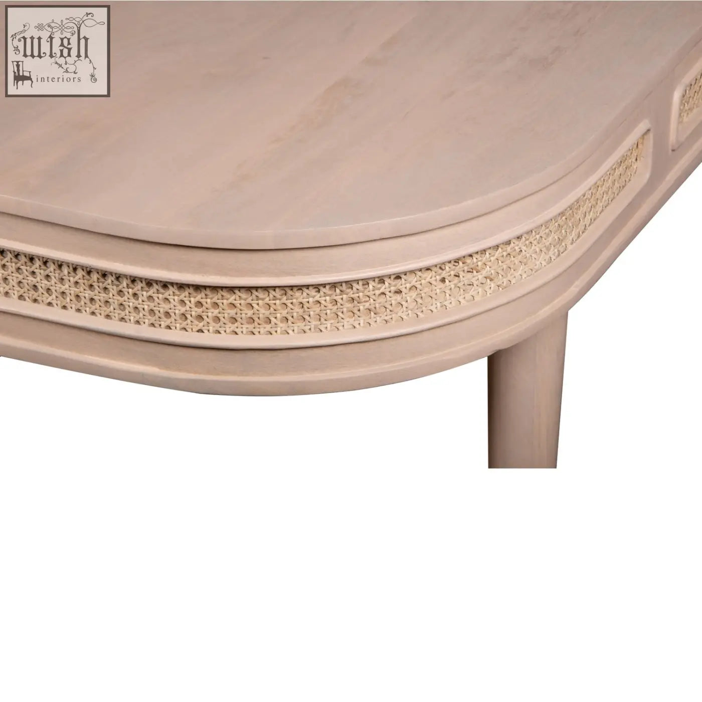 Beige wooden coffee table with a woven cane accent strip along curved edge featuring natural materials