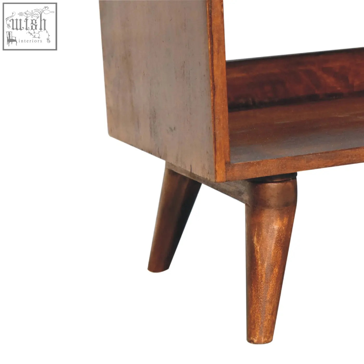 Chestnut bench with brown leather seatpad and mid-century modern wooden tapered legs in warm natural finish