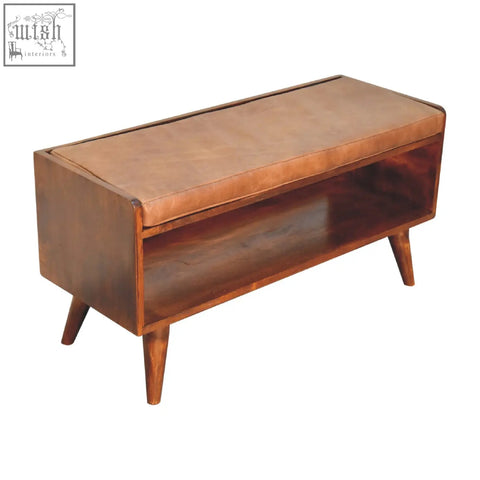 Chestnut bench with brown leather seatpad features tapered legs and a wooden frame with a lower shelf and brown leather seat