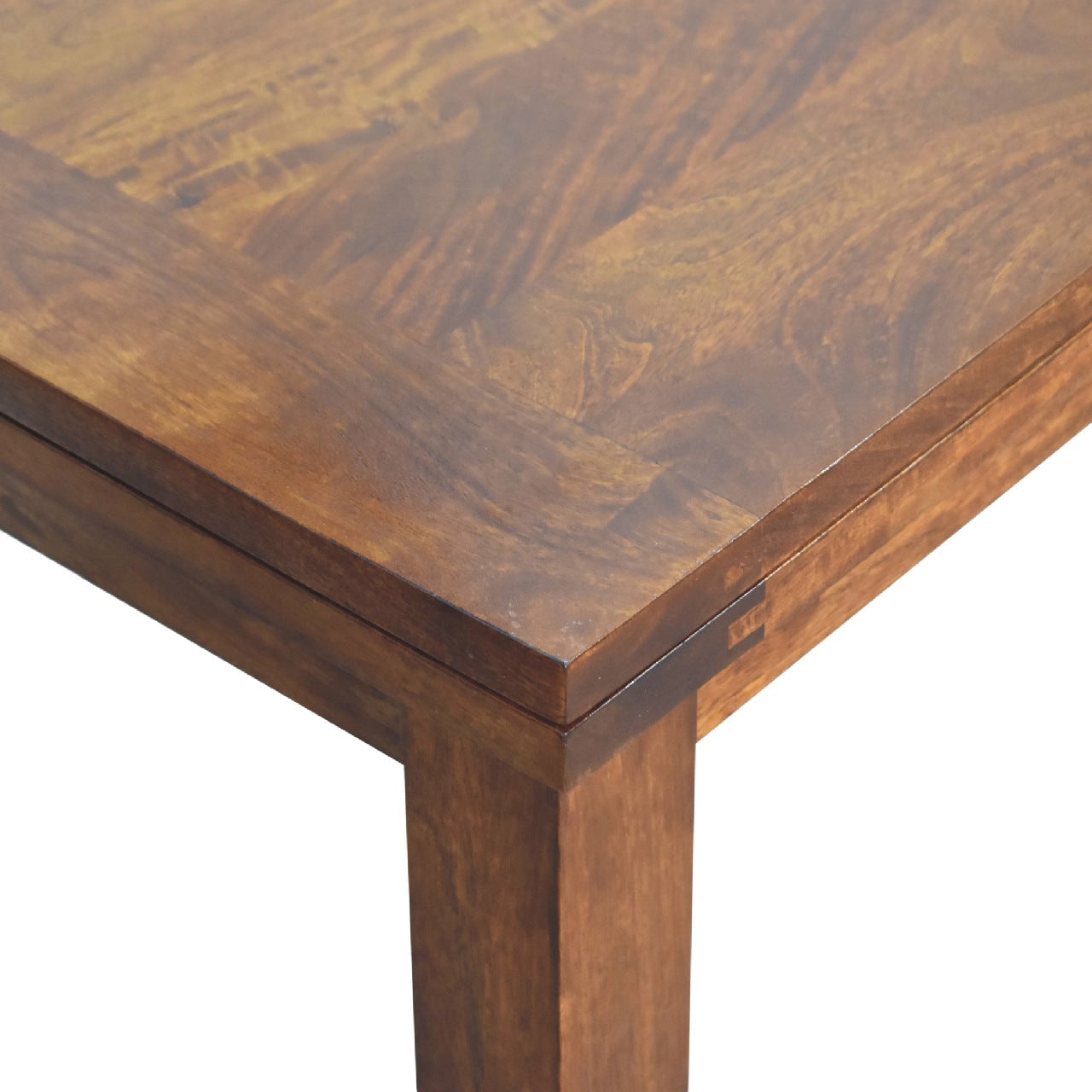 Chestnut butterfly dining table with rich warm-toned wood and smooth polished surface showing natural grain patterns