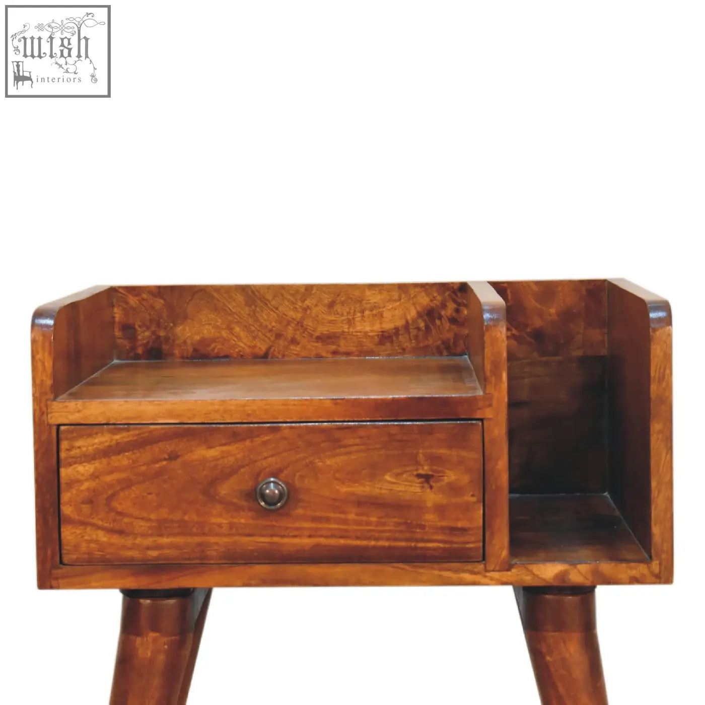 A warm chestnut collective bedside table with richly grained wood, small drawer, and open slot shelving on the right side