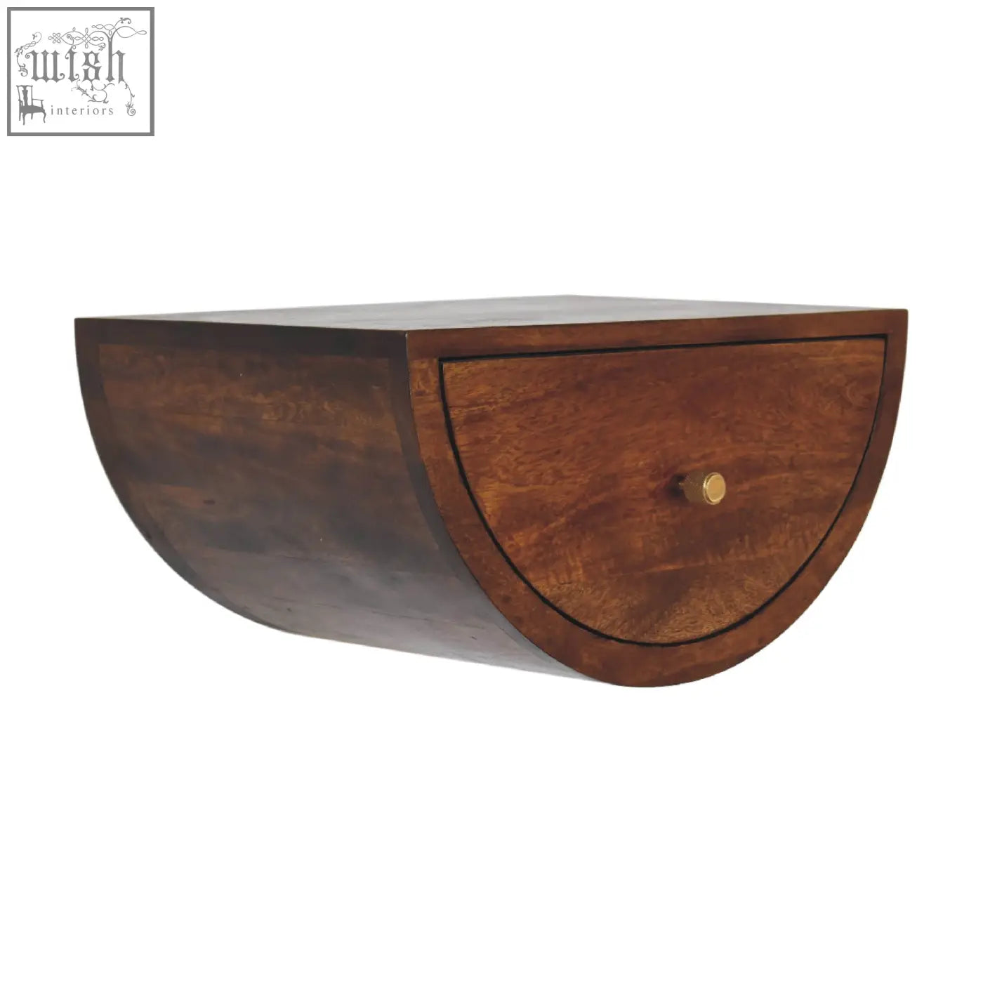 A chestnut crescent floating bedside table in dark brown wood with a half-moon shape and a brass knob drawer