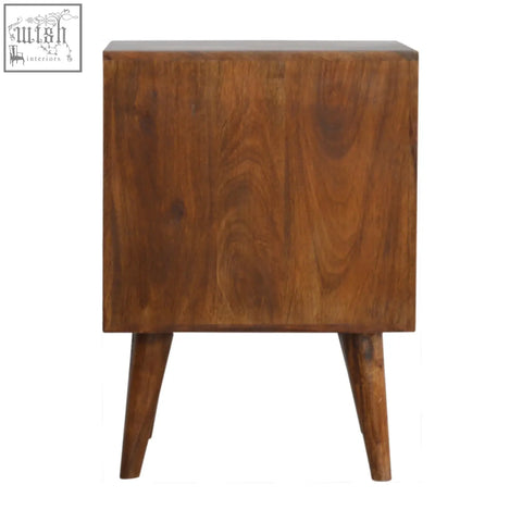 A sleek chestnut cube carved bedside table in dark brown wood with smooth drawer fronts and tapered legs