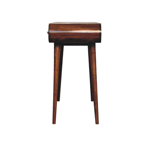 A sleek dark brown wooden side table with a curved top and tapered legs called chestnut mirror