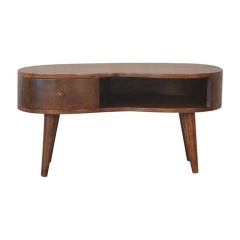 Chestnut wave coffee table is a mid-century modern oval coffee table in rich dark solid mango wood with drawer and open shelf
