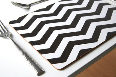 Black and white chevron set of four placemats with smooth wooden or laminated surface perfect for dining use