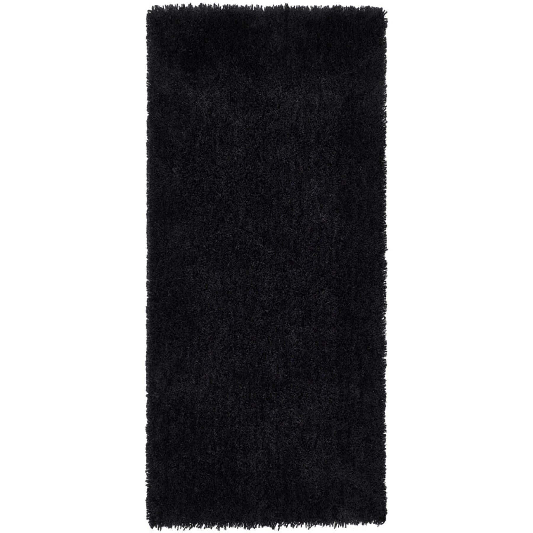 Plush chicago black shaggy rug with textured surface and fringed edges perfect for cozy living spaces