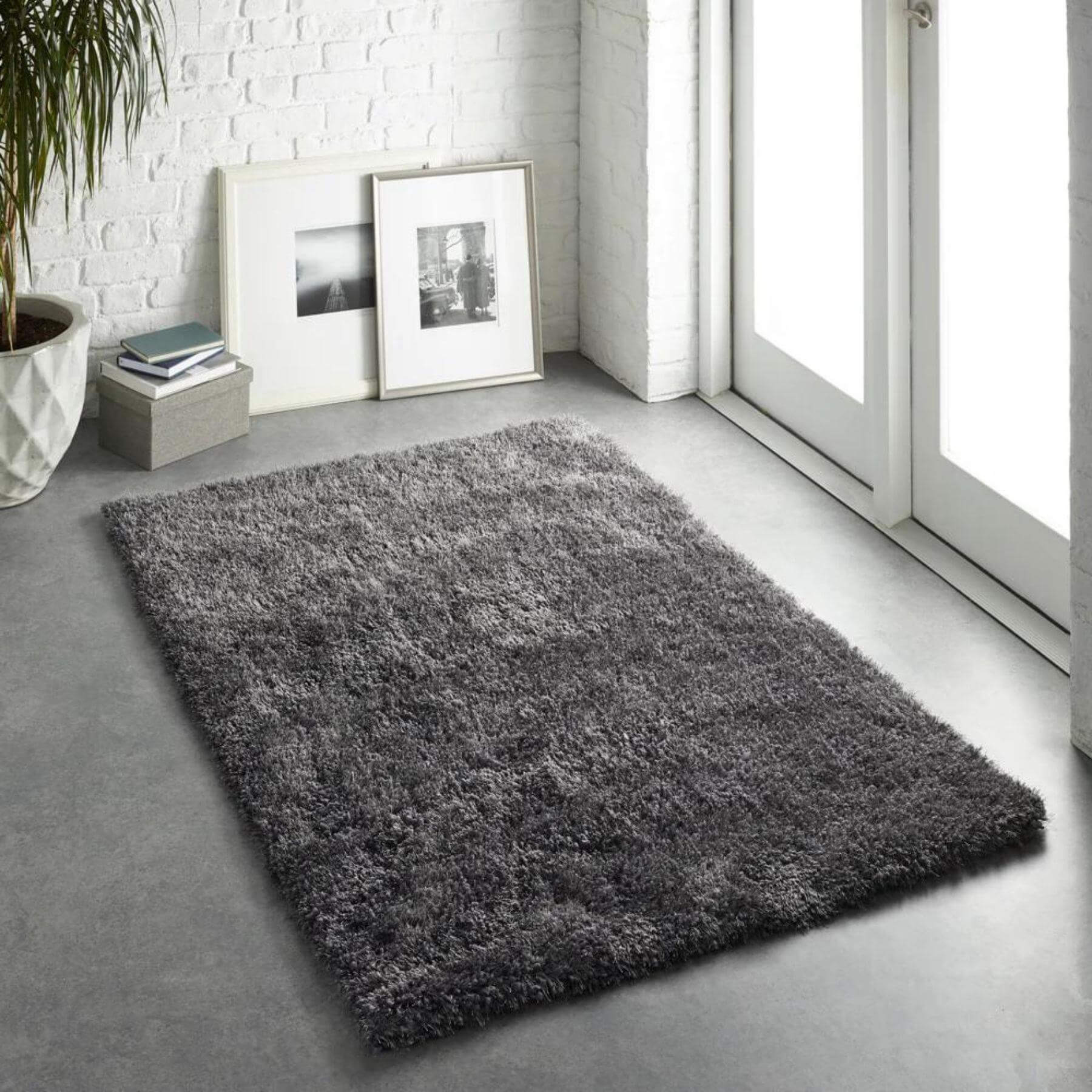 A plush dark gray shaggy rug with soft textured surface perfect for cozy spaces called chicago grey shaggy rug