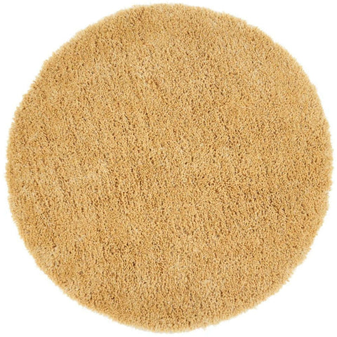 A plush round beige chicago ochre shaggy rug with a soft textured surface perfect for cozy spaces