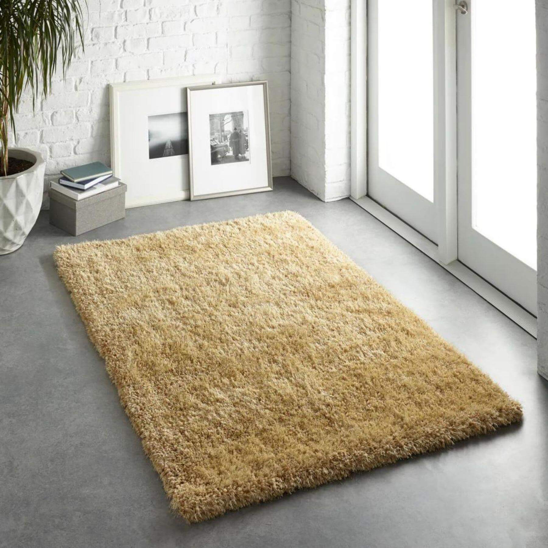 A plush golden-brown chicago ochre shaggy rug with a soft textured surface perfect for cozy floors