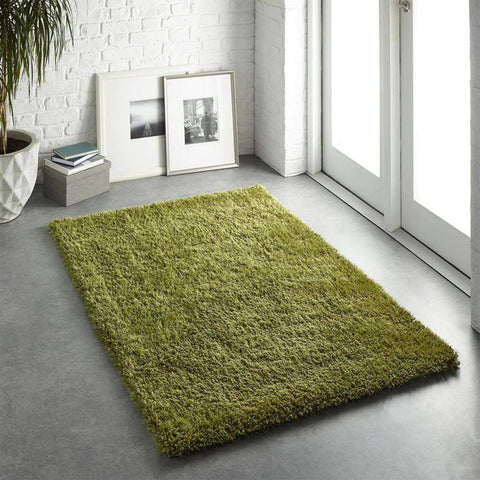 A plush chicago olive green shaggy rug with a soft textured surface adds cozy style to any room