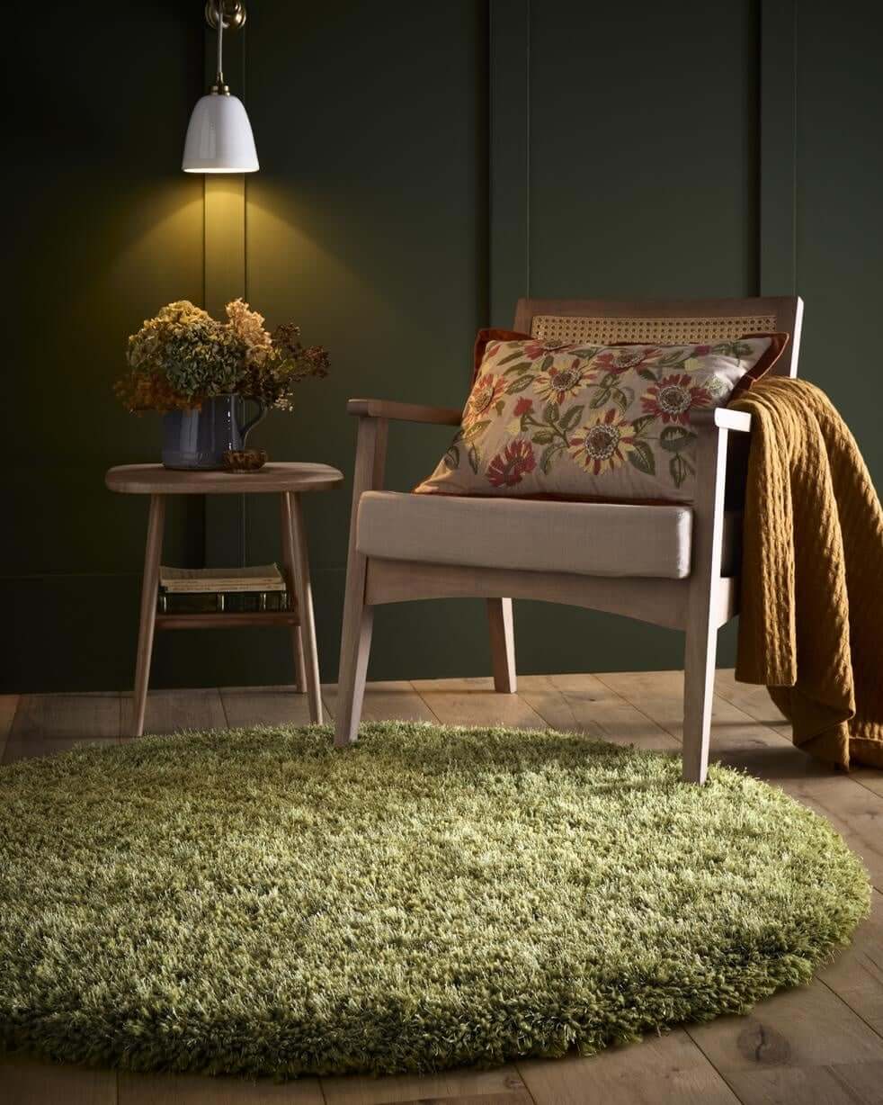 A plush round chicago olive green shaggy rug with a soft textured surface perfect for cozy spaces