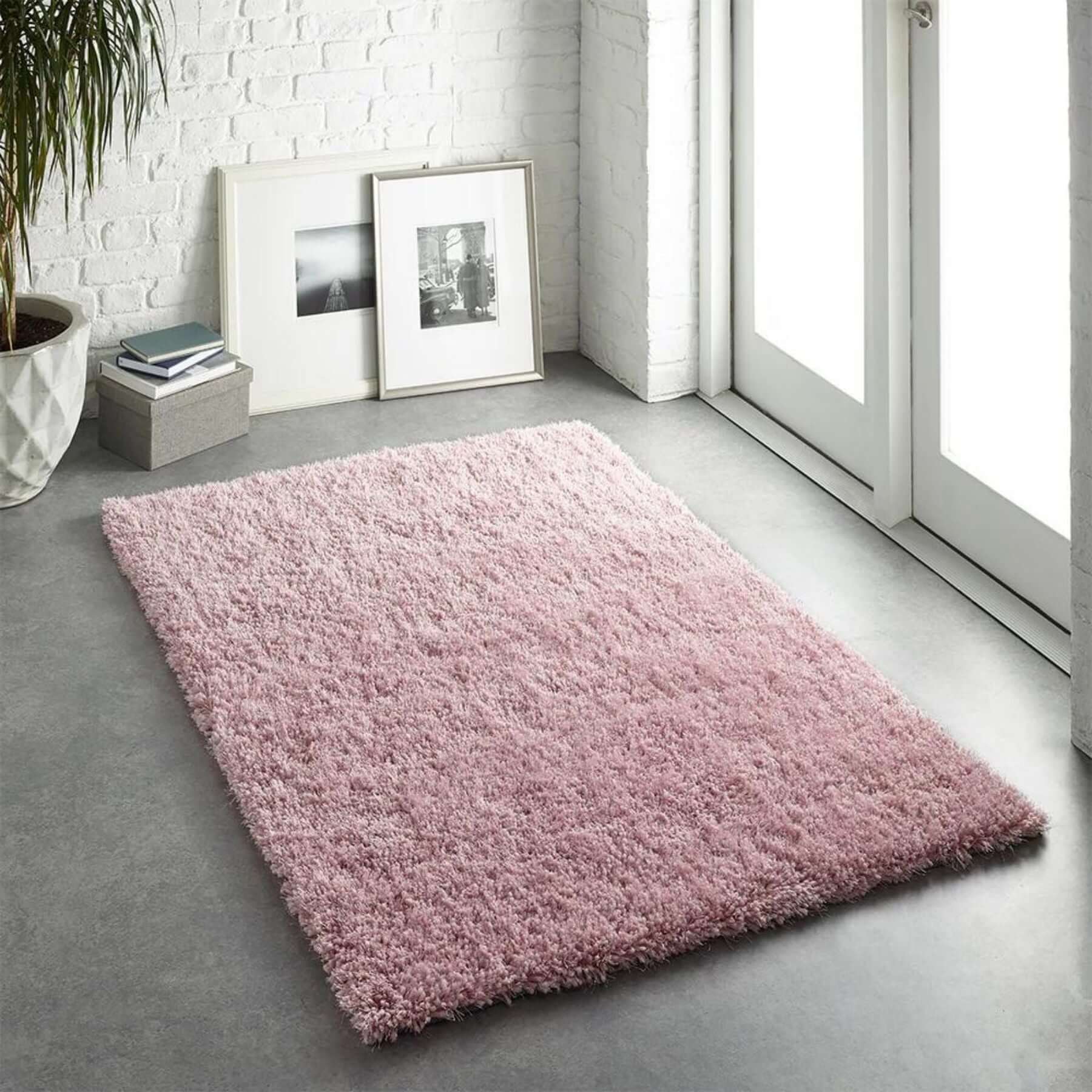 A plush soft pink shaggy rug with dense fluffy texture perfect for cozy spaces chicago pink shaggy style