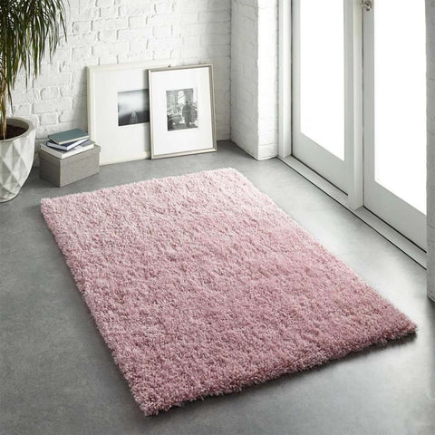 A plush soft pink shaggy rug with dense fluffy texture perfect for cozy spaces chicago pink shaggy style