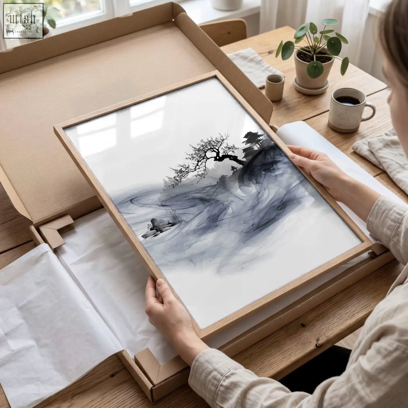 Minimalist wooden framed ink wash landscape artwork featuring a solitary tree and misty mountains in soft tones