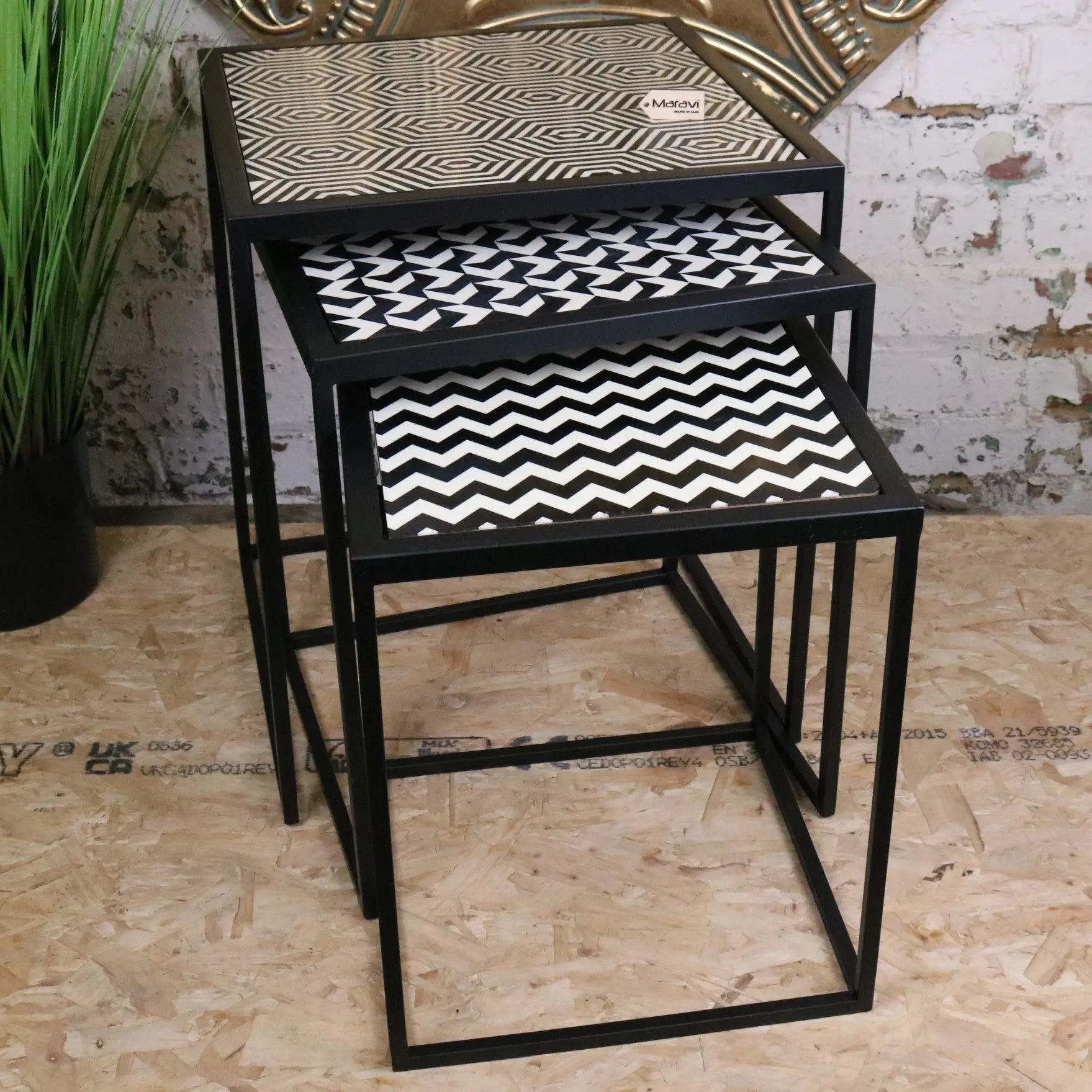 Set of three chinta modern black square nesting side tables with black metal frames and white black geometric resin tabletops