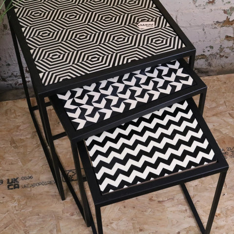 Set of three chinta modern black square nesting side tables with resin tabletops and geometric patterns in black and white