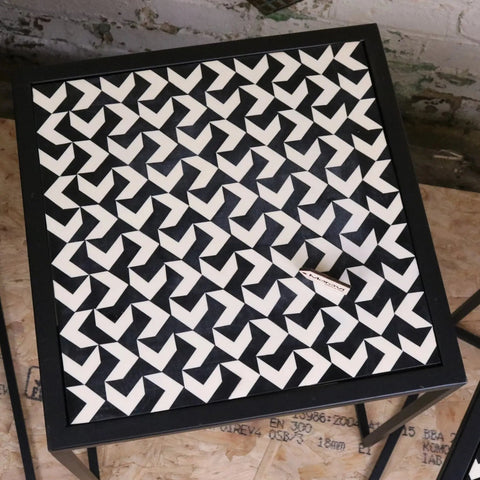 Chinta modern black square nesting side tables with black and white geometric resin tabletops and sleek modern design