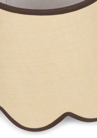 Beige linen placemat with scalloped edge and dark brown trim paired with chocolate brown jute scallop lampshade