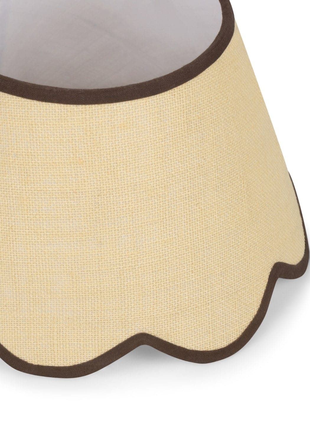 Beige linen lampshade with scalloped edge and dark brown trim made of brown jute perfect for cozy lighting