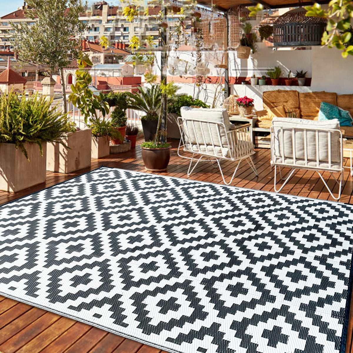 Choshome outdoor rug with black and white geometric pattern, waterproof woven portable large outdoor rugs for garden