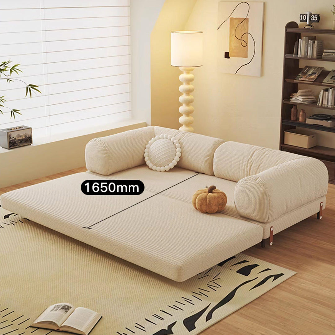 Cream-colored corduroy choudhury two seater sofa bed with plush rounded armrests and washable backrest