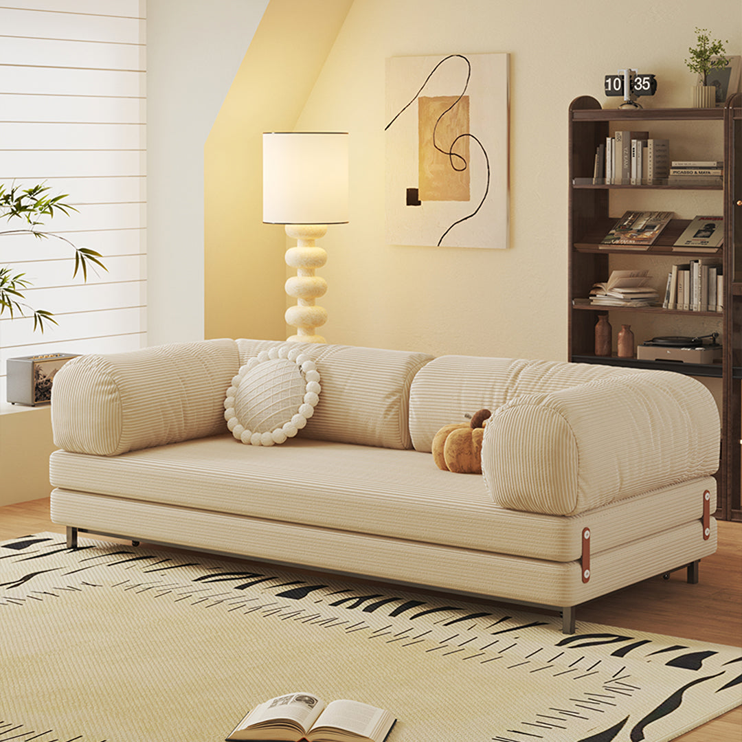 Cream-colored corduroy sofa bed with rounded armrests and washable backrest in a cozy modern two seater design